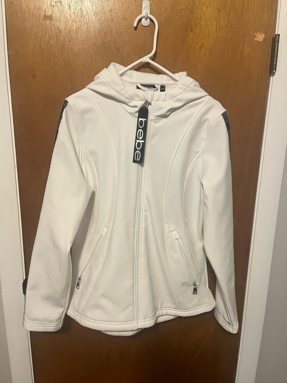 Ladies “Bebe” White Hooded Zip-Up Sport Jacket with Black Logo Trim